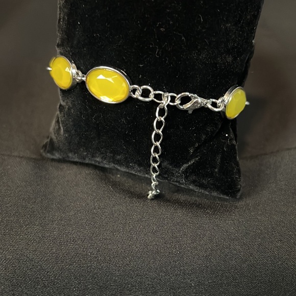 Yellow stone bracelet with silver accent. Extender enclosure to adjust fit. - Picture 4 of 5